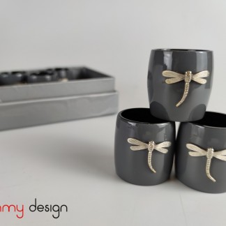 Set of 6 grey napkin rings attached with dragonfly